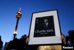 Организованное в Сиднее памятное бдение в честь убитого недавно в штате Юта американского крайне правого активиста и комментатора Чарли Кирка. 12 сентября 2025 года