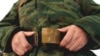 Russia -- A young man, just called-up to the military service, fastens the belt in the call-up center in the city of Kemerovo, 18Nov2007