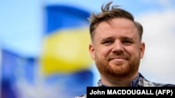 Максим Курников