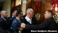 Tenzije i podjele zbog Zakona o vjeroispovijesti pratile su raspravu i usvajanje Zakona u Parlamentu, 27. decembra 2019., kada je zabelježna i ova fotografija