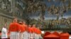 (FILES) This handout picture released by the Press office shows cardinals queuing in the Sistine Chapel to swear on the Bible to never reveal the secrets of their deliberations before the start of the conclave at the Vatican on March 12, 2013.