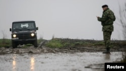 Prizor iz blizine pada letelice, 14. mart 2015.