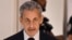 Fostul președinte francez, Nicolas Sarkozy, înainte de a intra în sala de judecată în care a fost pronunțat verdictul în dosarul de finanțare ilegală a campaniei electorale, Paris, 25 septembrie 2025.