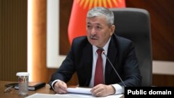 Адылбек Касымалиев.