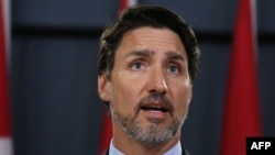 Canadian Prime Minister Justin Trudeau speaks at a news conference January 8 in Ottawa, Canada. 