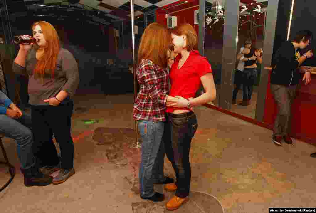 Women at a private gay club in St. Petersburg in 2013. A survey taken in 2013 showed 74 percent of Russians thought homosexuality was unacceptable in society, with a further 5 percent saying gays should be "liquidated."