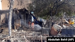 Разрушенные здания, бегущие жители: «Талибан» продолжает наступление в Афганистане (фотогалерея)