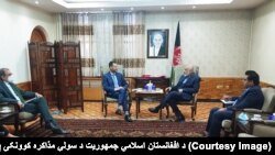 محمد معصوم ستانکزی له توماس نېکلاس سره