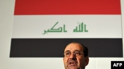 Iraqi Prime Minister Nuri al-Maliki addresses delegates during the "Invest Iraq 2009" conference in London on April 30.