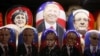 Russia -- Painted Matryoshka dolls, or Russian nesting dolls, bearing the faces of German Chancellor Angela Merkel, US Republican presidential nominee Donald Trump, French President Francois Hollande and Russian President Vladimir Putin are displayed for 
