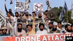 Activists in Islamabad shout anti-U.S. slogans during a protest against drone strikes, in the wake of a strike that killed the Pakistani Taliban leader Hakimullah Mehsud.