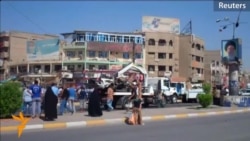 Car Bombs Kill Dozens in Baghdad Shi'ite Districts Car Bombs Kill Dozens in Baghdad Shi'ite Districts