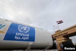 Грузовик с логотипом БАПОР на КПП между сектором Газа и Египтом, 27 ноября 2023 года