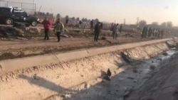 На месте крушения украинского самолета в Иране На месте крушения украинского самолета в Иране