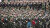 Russian troops march during a rehearsal for a Victory Day military parade ahead of May 9 in St. Petersburg on April 22.
