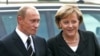 Putin and Merkel in Germany last year