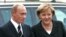 Putin and Merkel in Germany last year