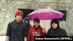 Kišobran kao privid zaštite od snega