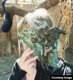 Одна из масок Нау