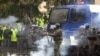 Police fire tear gas in Tbilisi on Nov. 7