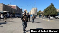 Iračke snage sigurnosti osiguravaju mjesto samoubilačkog napada u Bagdadu u Iraku 21. januara 2021