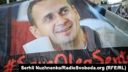 "Spasite Olega Sencova"