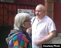 Людмила Кузьміна зі своїм адвокатом