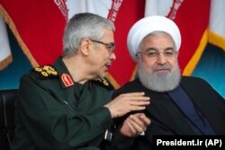 Iranski predsjednik Hasan Ruhani (desno) i načelnik Generalštaba oružanih snaga general Muhamud Husein Bagheri