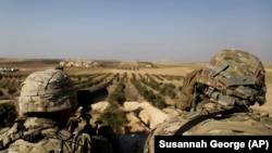 Американские военные на посту на границе Сирии и Турции