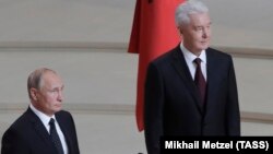Президент РФ Владимир Путин и мэр Москвы Сергей Собянин во время церемонии инаугурации
