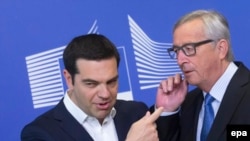 Aleksis Cipras i Žan Klod Junker