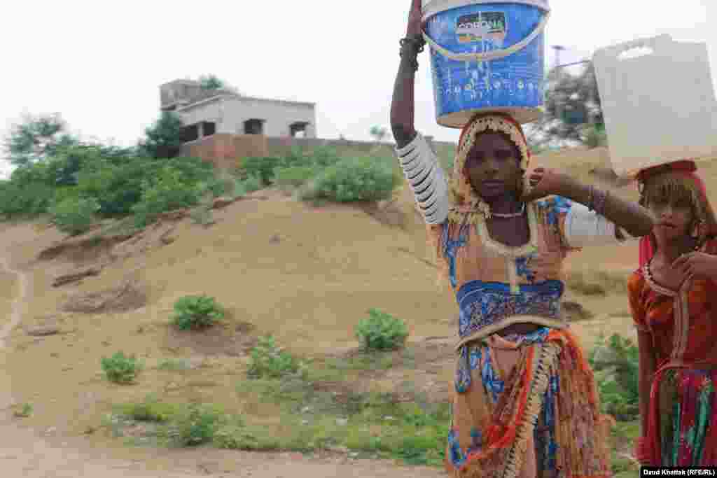 It is often women who are responsible for fulfilling the family&rsquo;s water needs, and they bring water on their heads from as far as a kilometer away.&nbsp;