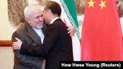 دیدار محمدجواد ظریف با همتای چینیاش، وانگ یی، در سال ۲۰۱۹