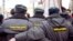 Сотрудники милиции во время разгона акции за свободу собраний на Триумфальной площади в Москве.