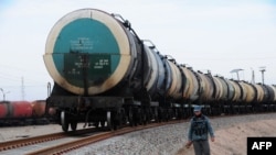 A policeman patrols alongside a new railway track in northern Afghanistan. (file photo)