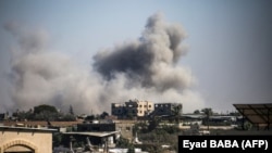 Dim iz centralnog dela Pojasa Gaze posle izraelskog napada, 13. juli 2025.