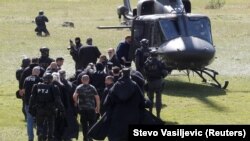 Pratnja patrijaru Jonikiju do helikoptera pored manastira na Cetinju, 5. septembar 2021.
