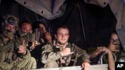 Pripadnici Wagnera u Rostovu na Donu, u Rusiji, u subotu, 24. juna 2023., dok se pripremaju napustiti područje u sjedištu Južnog vojnog okruga. 