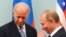 Джо Байден и Владимир Путин во время встречи в Москве 10 марта 2011 года
