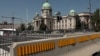 Serbia, Belgrade -- The square in front of the National Assembly in Belgrade, where for more than four months, government supporters have been blocking one of the busiest intersections in Serbia's capital.