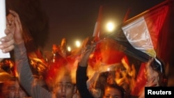 Супротивники Мубарака святкують відставку президента на площі Тахрір у Каїрі, 11 лютого 2010 року