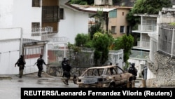 Pripadnici specijalnih snaga FAES patroliraju ulicama kvarta Kota 905 u Karakasu, juli 2021.