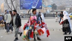 People have been going about their daily business in Kabul despite security warnings from the authorities.