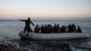 Dolazak migranata iz Afganistana na grčko ostrvo Lezbos nakon što su prešli Egejsko more iz Turske, 2. mart