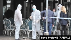  Policijski istražitelji na mjestu eksplozije bombe u Podgorici, 2. aprila 2018. (Ilustrativna fotografija)