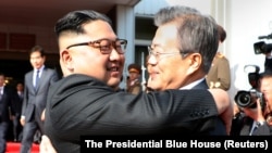 Ким Чен Ын и Мун Чжэ Ин