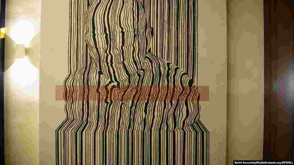 Плакат присвячений Ніку Голоняку, сину українськиї емігрантів із Закарпаття, володарю 41 патенту у галузі електротехніки. Найвідомішим його винаходом вважається лазерний діод, що використовується в оптоволоконних лініях зв'язку, при зчитуванні СD/DVD дисків та товарних кодів тощо