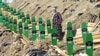 The burial on July 11 of 308 newly identified victims killed by Bosnian Serb forces in Srebrenica
