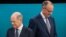 Настоящият канцлер на Германия Олаф Шолц (вляво) и вероятният бъдещ канцлер Фридрих Мерц