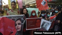 Protesters attend a demonstration in Karachi on December 24 after Pakistani human rights activist Karima Baloch was found dead in Toronto two days earlier.